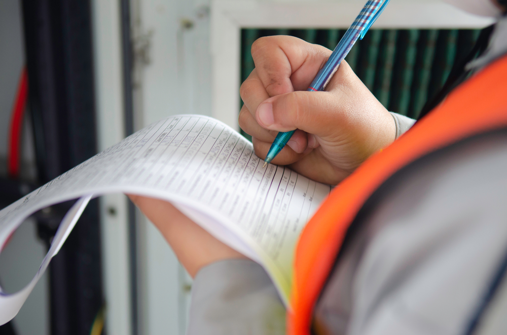 engineer,wear,safety,equipment,write,and,record,inspection,report,worker,write